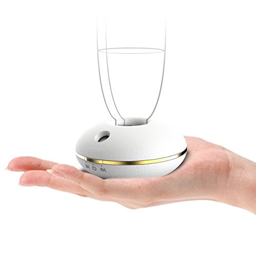 A TINY DEVICE THAT TURNS A PERSONAL WATER BOTTLE INTO A POWERFUL HUMIDIFIER