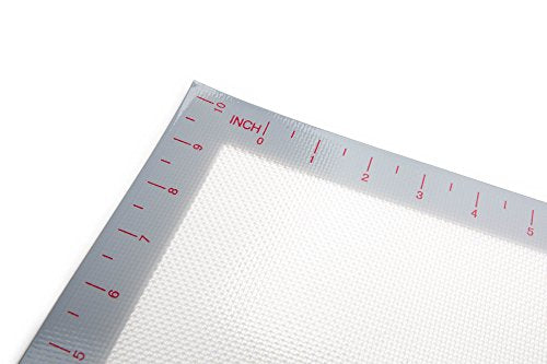 A SILICONE BAKING MAT THAT EVENLY BAKES COOKIES AND TREATS