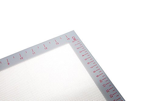 A SILICONE BAKING MAT THAT EVENLY BAKES COOKIES AND TREATS
