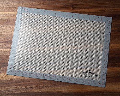A SILICONE BAKING MAT THAT EVENLY BAKES COOKIES AND TREATS