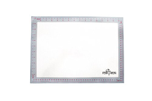 A SILICONE BAKING MAT THAT EVENLY BAKES COOKIES AND TREATS