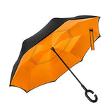 AN INVERTED UMBRELLA THAT'LL KEEP YOU DRYER THAN A NORMAL UMBRELLA