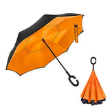 AN INVERTED UMBRELLA THAT'LL KEEP YOU DRYER THAN A NORMAL UMBRELLA