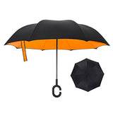 AN INVERTED UMBRELLA THAT'LL KEEP YOU DRYER THAN A NORMAL UMBRELLA