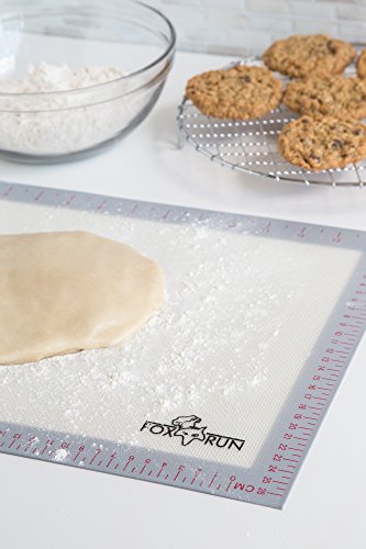 A SILICONE BAKING MAT THAT EVENLY BAKES COOKIES AND TREATS