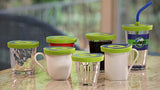 THESE GENIUS LIDS THAT TURN ANY GLASS OR MUG INTO A TRAVEL CUP